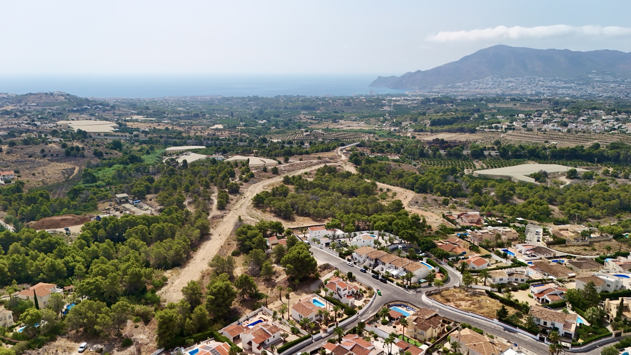 Aerial view toward the sea and mountains from Bello Horizonte
