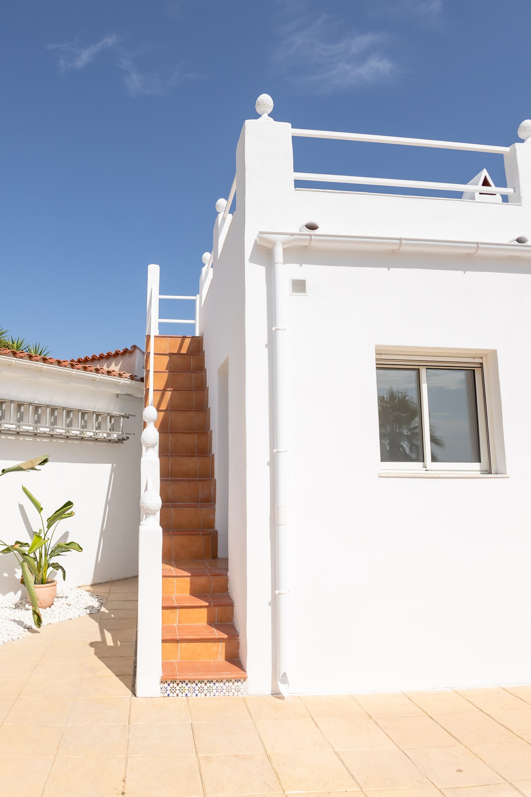 Terracotta stair to the solarium from the terrace